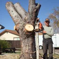 Signature Landscapes - Dave and his giant blade! He's so proud of that machine!