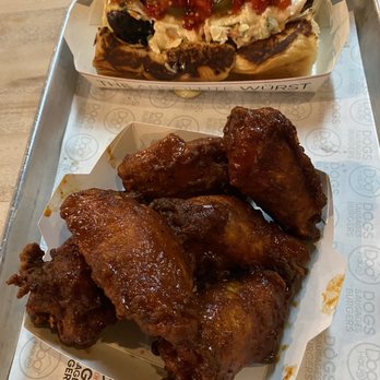 Dog Haus - Buffalo Wings & T- MEX = BEEF CHORIZO & PEPPER JACK SAUSAGE, AVOCADO, CHIPOTLE AIOLI, HAUS SLAW, PICKLED JALAPEÑOS, PICKLED PEPPERS - Burgers Near Me - Carson, California Dog Haus - Buffalo Wings & T- MEX = BEEF CHORIZO & PEPPER JACK SAUSAGE, AVOCADO, CHIPOTLE AIOLI, HAUS SLAW, PICKLED JALAPEÑOS, PICKLED PEPPERS - Burgers Near Me - Carson, California