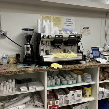Las Palmas - a counter with coffee machines - Cuban Near Me - Miami, Florida Las Palmas - a counter with coffee machines - Cuban Near Me - Miami, Florida