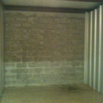 Abbott West Self Storage - Wet back walll. Note the darker color of the top of the wall. - Self Storage Near Me - Nashville, Tennessee