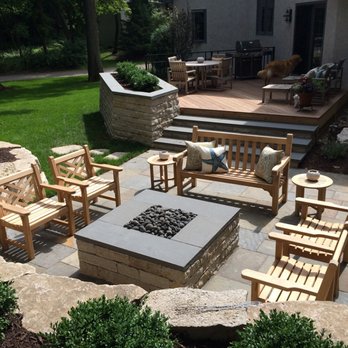 Entertaining Areas With A New Wood Deck Raised Limestone Planter