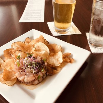 WSW Steakhouse - Appetizer: Kona kampachi poke -- pretty but otherwise unremarkable, with bagged potato chips. - Steakhouses Near Me - Hilo, Hawaii WSW Steakhouse - Appetizer: Kona kampachi poke -- pretty but otherwise unremarkable, with bagged potato chips. - Steakhouses Near Me - Hilo, Hawaii