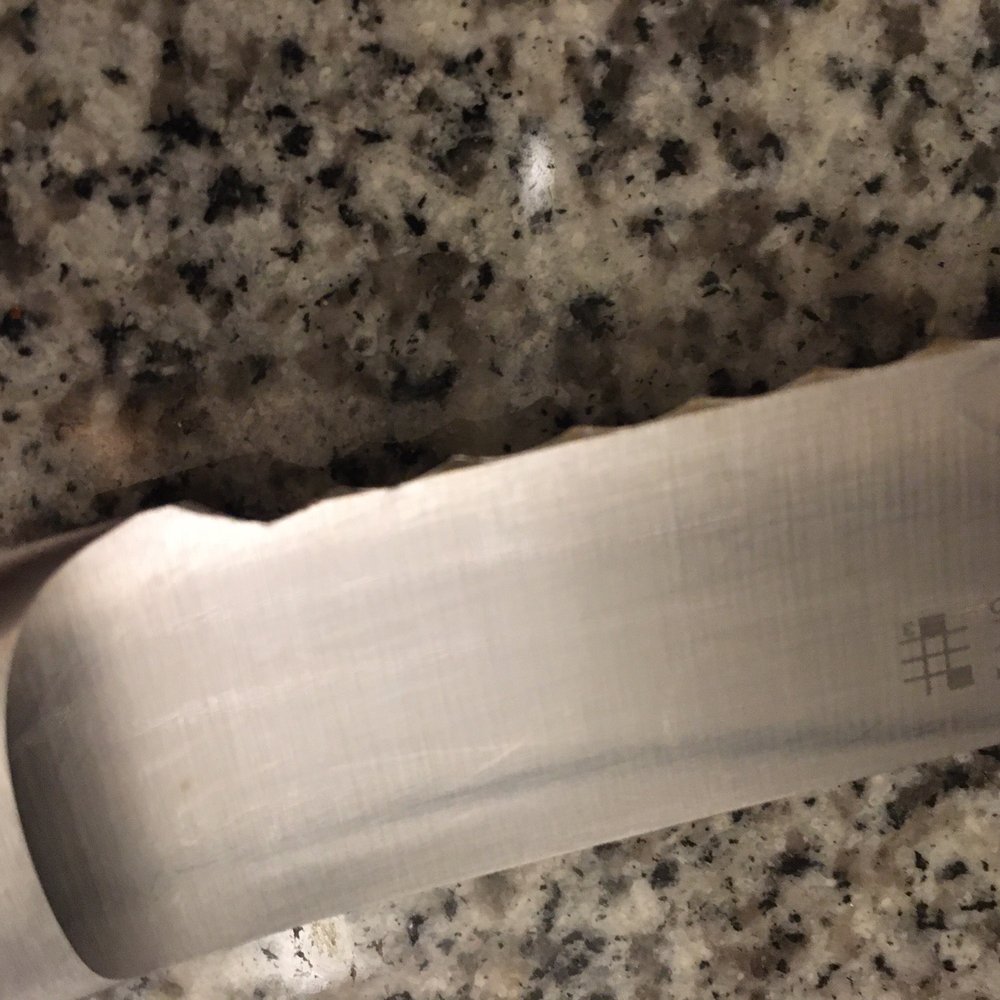 Cutting Edge Professional Sharpening Service - Backside of bread knife. - Knife Sharpening Near Me Cutting Edge Professional Sharpening Service - Backside of bread knife. - Knife Sharpening Near Me