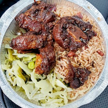 Tropical Rhythm - Regular size order of oxtail with rice & peas and cabbage - Caribbean Near Me - Brandon, Florida