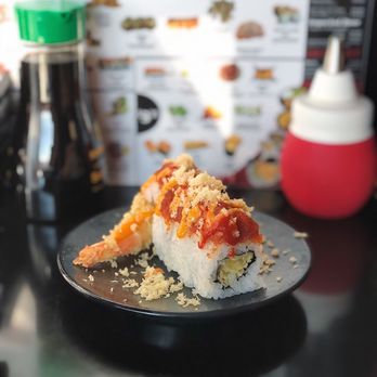 Sushi Chiyo - Yoko Roll (shrimp tempura, topped with spicy tuna, sriracha sauce & crunch on top) - Conveyor Belt Sushi Near Me - Beaverton, Oregon Sushi Chiyo - Yoko Roll (shrimp tempura, topped with spicy tuna, sriracha sauce & crunch on top) - Conveyor Belt Sushi Near Me - Beaverton, Oregon