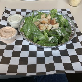 New York Pizza and Pints - My 1/2 Caesar Salad with a container of ranch dressing as well as a container of oddly colored reddish Caesar dressing. - Pizza Near Me - Addison, Texas New York Pizza and Pints - My 1/2 Caesar Salad with a container of ranch dressing as well as a container of oddly colored reddish Caesar dressing. - Pizza Near Me - Addison, Texas