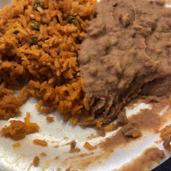 Taco Rico - Half of the rice and beans. - Mexican Near Me - Dallas, Texas