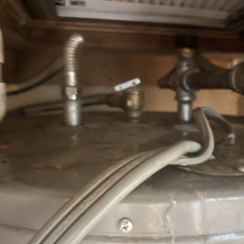 Will Fix It - Water dripping from AC onto water heater - Plumbing Near Me - San Antonio, Texas Will Fix It - Water dripping from AC onto water heater - Plumbing Near Me - San Antonio, Texas