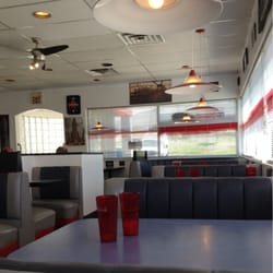 The Pizza Place - Tables aren't cleaned for hours.