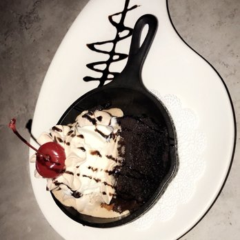 Cinco Restaurant - warm brownie with chocolate whipped cream, vanilla ice cream & a cherry on top - Puerto Rican Near Me - Aguadilla, Puerto Rico Cinco Restaurant - warm brownie with chocolate whipped cream, vanilla ice cream & a cherry on top - Puerto Rican Near Me - Aguadilla, Puerto Rico