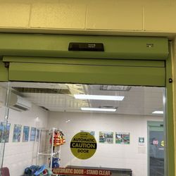 Splash Zone Aquatic Center - Look up. The black box above is the "eye" to open the automatic doors.