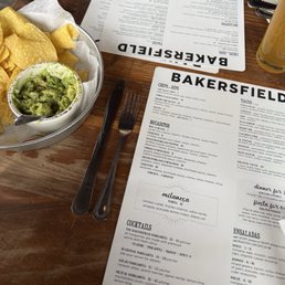 Menu and chips and guacamole.