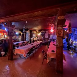 Arkey Blue's Silver Dollar Saloon - Seating with plenty of ashtrays