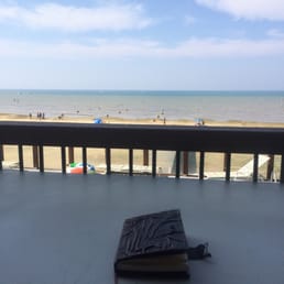 Relaxing on our lake front patio with a beautiful view. Relaxing on our lake front patio with a beautiful view.
