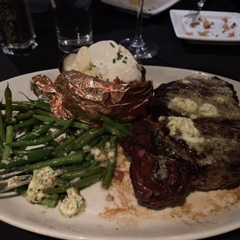 SeaVenture Restaurant - 28 Oz Char Grilled Rib Eye with baked potato and green beans - New American Near Me - Pismo Beach, California SeaVenture Restaurant - 28 Oz Char Grilled Rib Eye with baked potato and green beans - New American Near Me - Pismo Beach, California