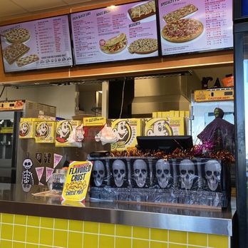 Hungry Howie's Pizza - Front counter with bench seating across the way. - Pizza Near Me - Las Vegas, Nevada Hungry Howie's Pizza - Front counter with bench seating across the way. - Pizza Near Me - Las Vegas, Nevada