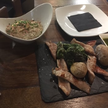 El Aguador - Pork grilled with mojo and potatoes, risotto with a quail egg and foie. - Spanish Near Me - Seville, SE El Aguador - Pork grilled with mojo and potatoes, risotto with a quail egg and foie. - Spanish Near Me - Seville, SE
