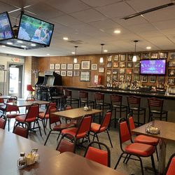 Remodeled bar and dining room with overhead TVs and Ms. Pac-man by the door