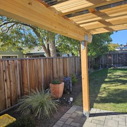 Santa Rosa waterproof patio cover with Alaskan Yellow Cedar Glu-lam beams and rafters.