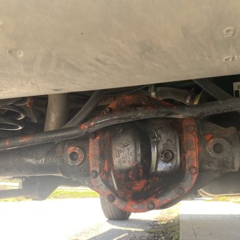 Firestone Complete Auto Care - Rear differential that should be all black with orange silicone rubbed all over-never cleaned up. - Tires Near Me - Raymore, Missouri
