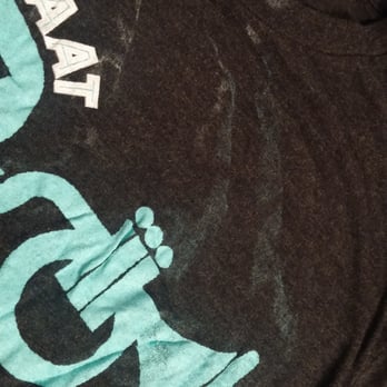 Fleur De Lis Dry Cleaning - T-shirt with damage to the print (several years old and washed/dried many times without any problems before) - Dry Cleaning Near Me - New York, New York