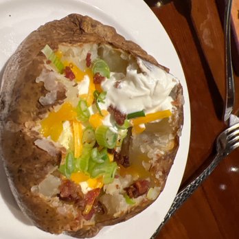 LongHorn Steakhouse - Loaded baked potato - Steakhouses Near Me - Fleming Island, Florida LongHorn Steakhouse - Loaded baked potato - Steakhouses Near Me - Fleming Island, Florida