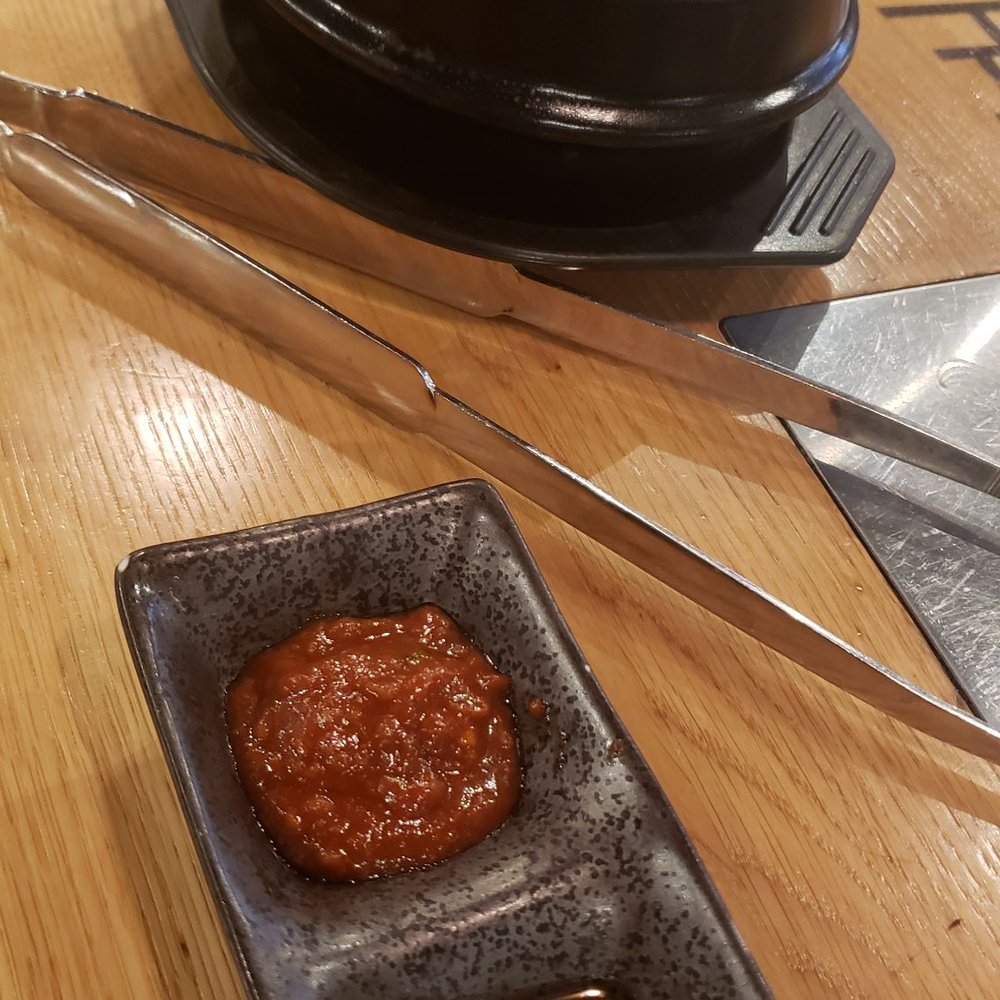 Yumira - Spicy tofu soup, sauces (salt not shown) - Vietnamese Near Me - Munich, BY