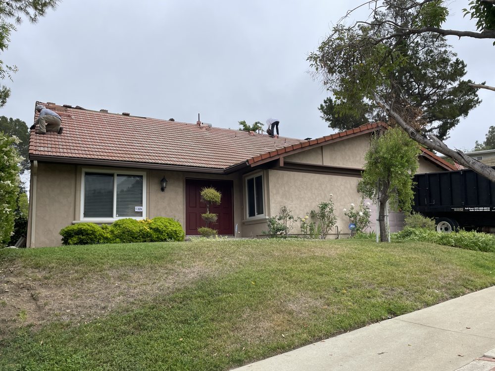 Slide of Roofing Contractors Inc