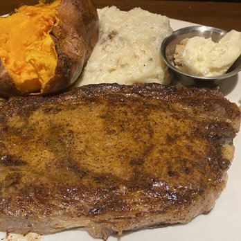 Outback Steakhouse - Ribeye with potato's both sweet and mashed potatoes - Steakhouses Near Me - Charlotte, North Carolina Outback Steakhouse - Ribeye with potato's both sweet and mashed potatoes - Steakhouses Near Me - Charlotte, North Carolina