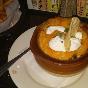 Croxley's - Piccadilly Chili (topped with cheese, sour cream & tortilla chips) - Sports Bars Near Me - Farmingdale, New York Croxley's - Piccadilly Chili (topped with cheese, sour cream & tortilla chips) - Sports Bars Near Me - Farmingdale, New York