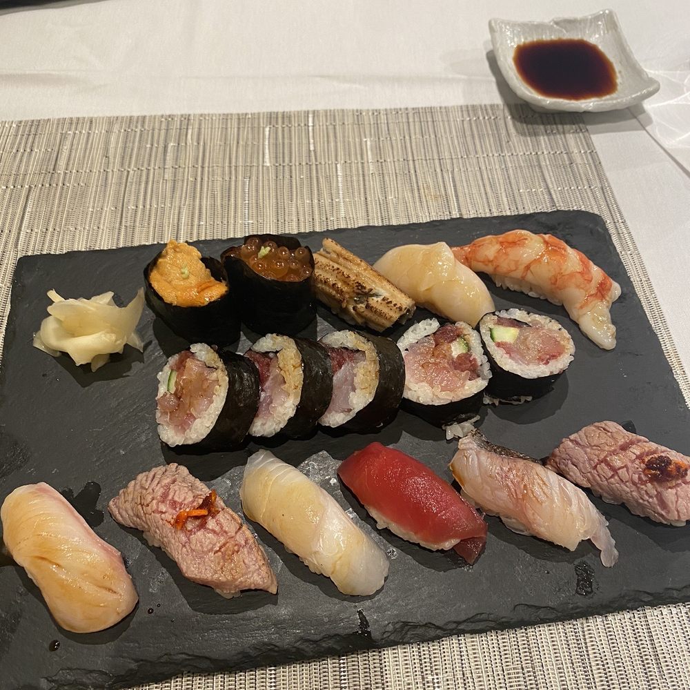 a plate of sushi on a table a plate of sushi on a table