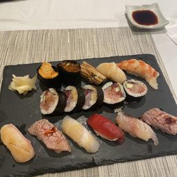 a plate of sushi on a table