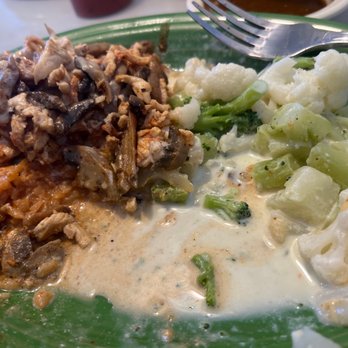 El Puerto - a green plate of food with rice, broccoli, and cauliflower - Mexican Near Me - Hastings, Nebraska