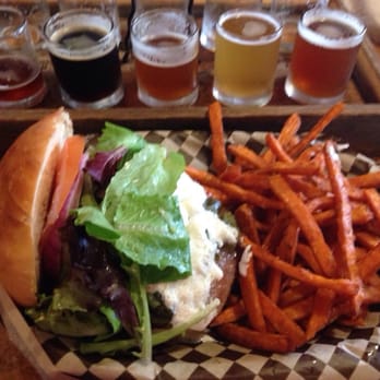Bitter Root Brewing - Second Date Burger (burger w/ date sauce, bacon, cheese, garlic aioli, LTO), sweet potato fries, and the beer sampler - American Near Me - Hamilton, Montana
