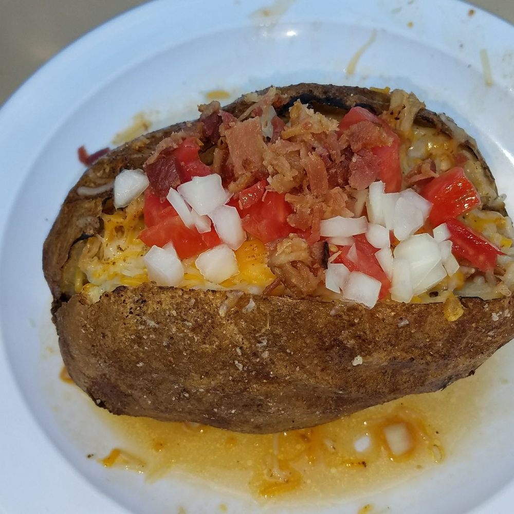 Red House BBQ - bbq pork stuffed baked potatoe. Needs more stuff 4 its size & sauce. - Barbeque Near Me - Tehachapi, California