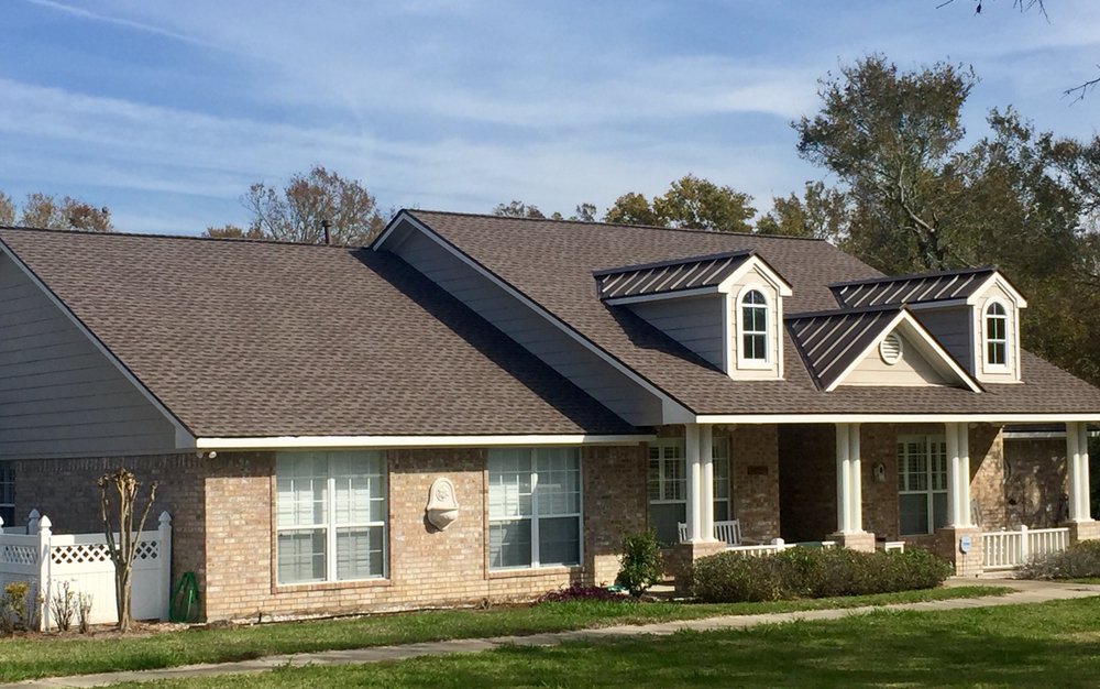 Slide of Tradition Roofing & Construction