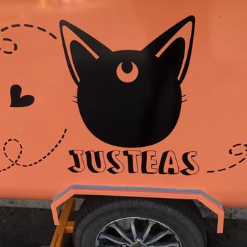 Justeas - a black cat on an orange food truck - Bubble Tea Near Me - San Jose, California
