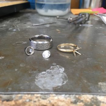 The Jewel House - Custom engagement ring in progress. Titanium band with platinum bezel and 1 carat round brilliant diamond. - Jewelry Near Me - Parma, Ohio The Jewel House - Custom engagement ring in progress. Titanium band with platinum bezel and 1 carat round brilliant diamond. - Jewelry Near Me - Parma, Ohio