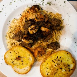 Brother’s Bar & Steakhouse - This is the Steak Tips and Blackened Shrimp Alfredo Pasta. This is a hearty meal and the use of spaghetti noodles as the pasta was unique.