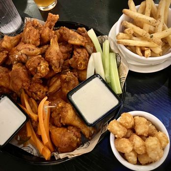 Timothy O'Toole's Pub Gurnee - 30 Wings (GF) with tater Side Tots (GF) and Ala Carte Truffle Fries - Sports Bars Near Me - Gurnee, Illinois