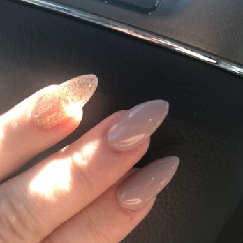 Tip Top Nails & Spa - Not happy. Bubbles on pointer. Middle finger doesn't match shape of other nails even though it was pointed out multiple times. Waste of time - Nail Salons Near Me - Venice, Florida