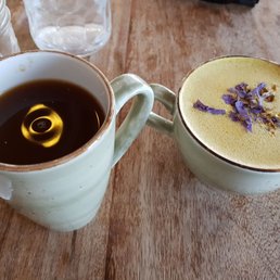 Brewed coffee and a mellow yellow tea latte Brewed coffee and a mellow yellow tea latte