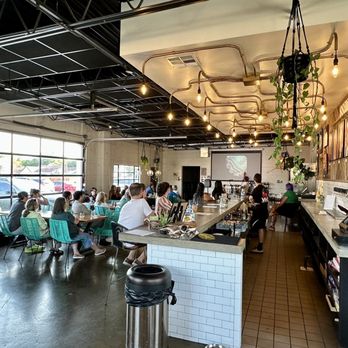 Heirloom Rustic Ales - people sitting at tables in a restaurant - Breweries Near Me - Tulsa, Oklahoma