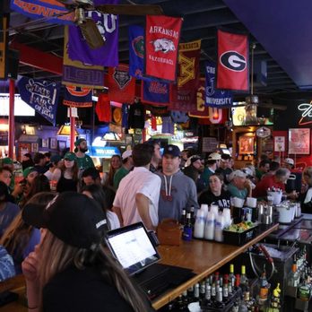 Stan's Blue Note - a crowd of people sitting at a bar - Sports Bars Near Me - Dallas, Texas