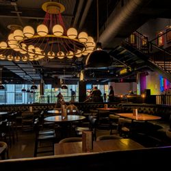 Puttshack - Inside Puttshack Atlanta Midtown at The Interlock. Downstairs dining area.