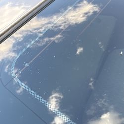 Ogden Window Tinting - Lots of these bubbles on different parts of the glass from the front to the rear and they call this normal.