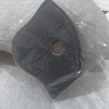 Walgreens - Love it - A black vacuum cleaner filter with a circular hole in the center, wrapped in clear plastic, placed on a soft, textured surface. - Cosmetics & Beauty Supply Near Me - Redding, California