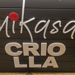 Mikasa Criolla Empanadas - Restaurant signage