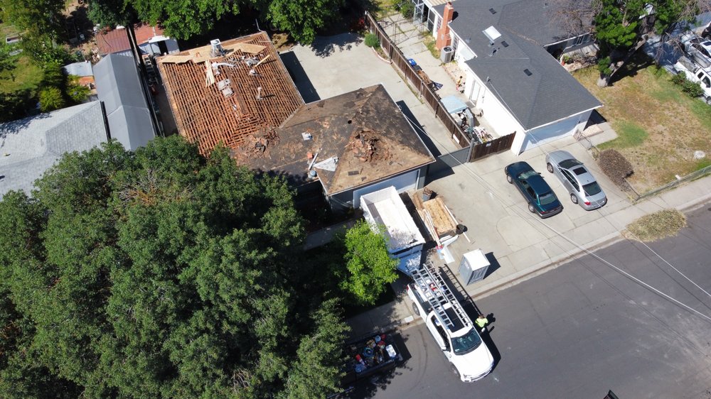 Slide of Legend Roofing Company