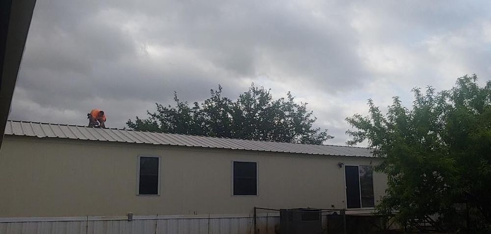 Slide of Texas Home Roofing And Construction